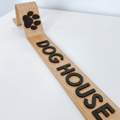 wooden dog house sign