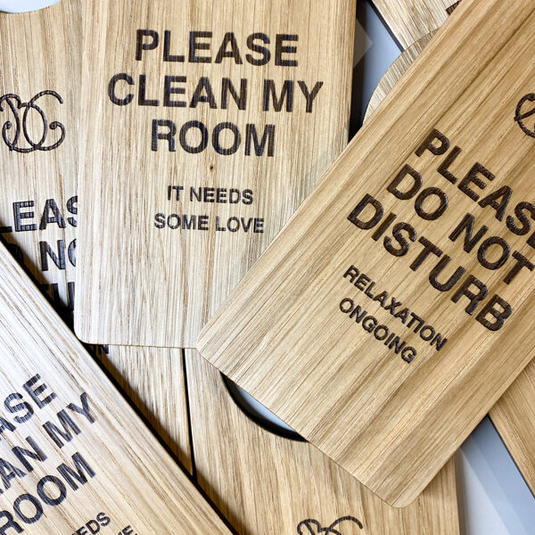 Hotel room door hangers