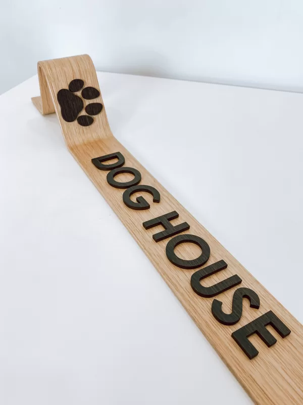 wooden dog house sign